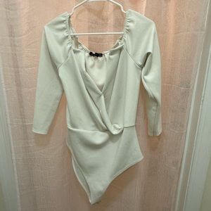 Boohoo bodysuit. For dates or dressing up a pair of pants for an event or work!